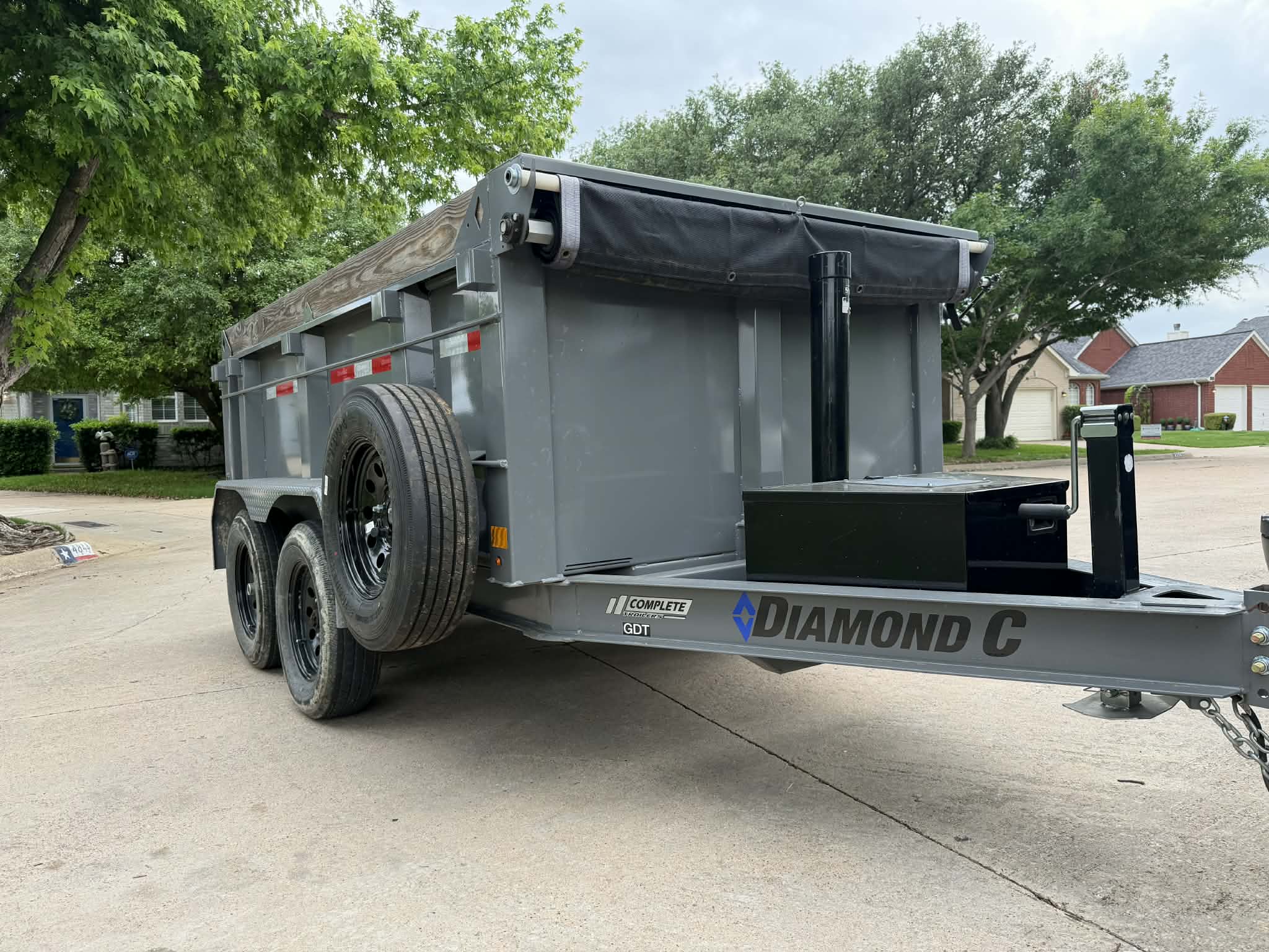 Diamond C GDT dump trailer front view available for rent in Keller TX